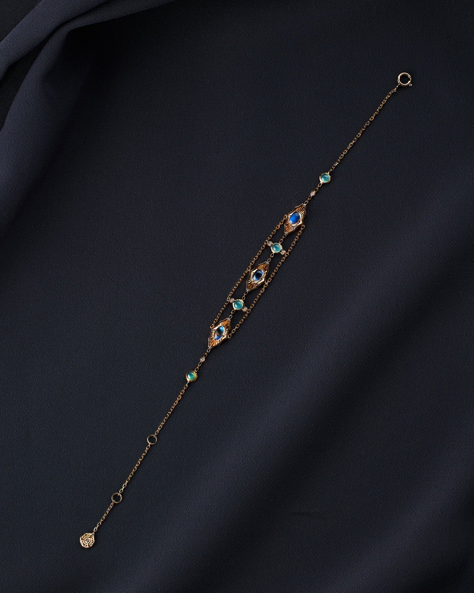 Rainbow moonstone and diamond bracelet in 18K gold from Ostara’s Majolica collection