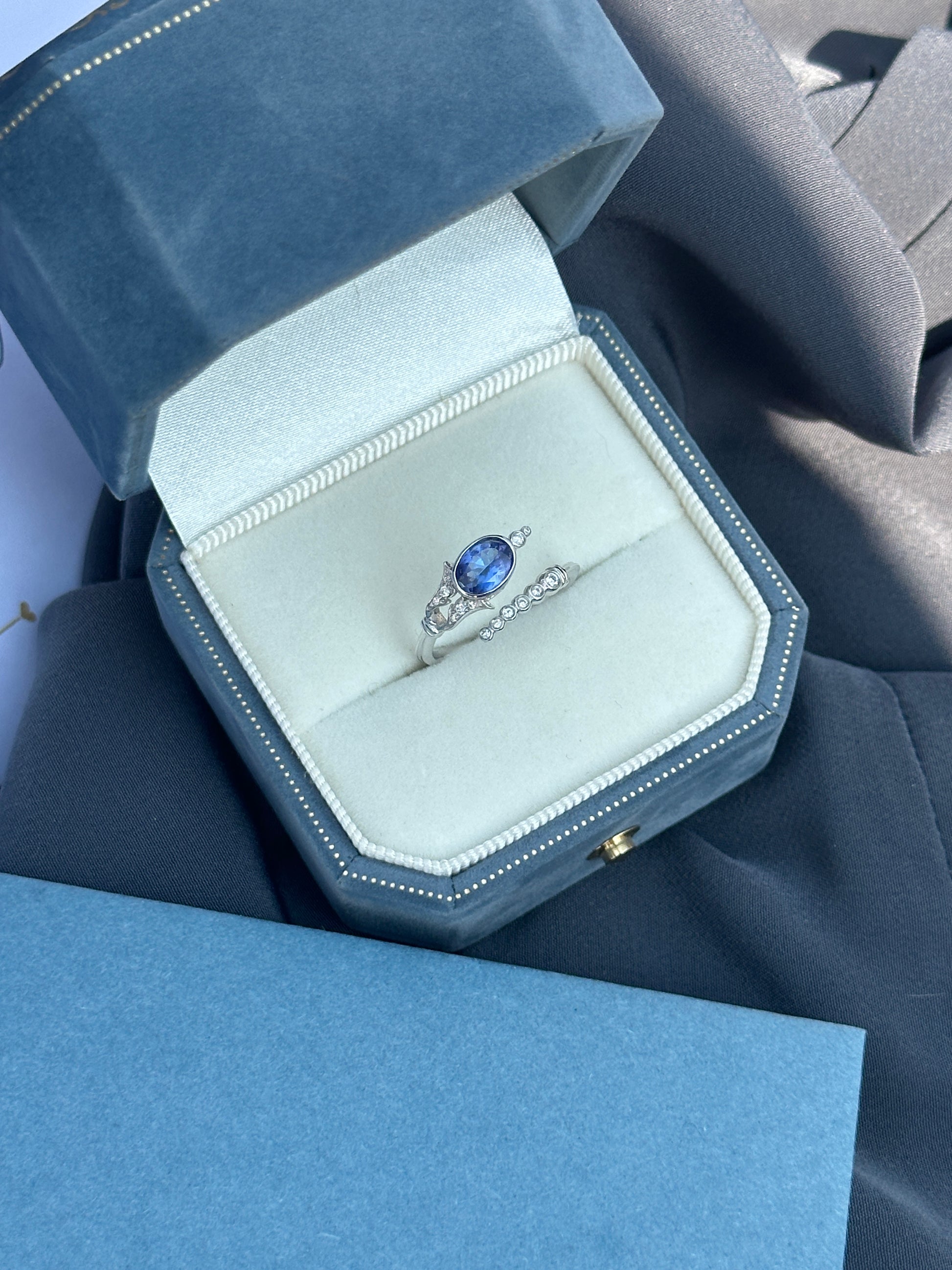 Tanzanite and diamond ring featuring vintage-style Acanthus design by Ostara Jewelry