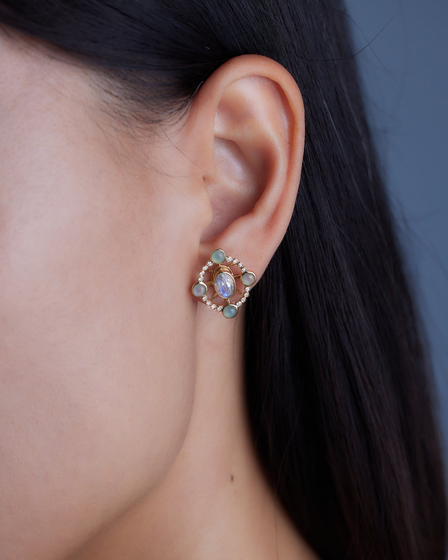 Convertible diamond earrings from Ostara’s Roma collection with moonstone studs; center stone can be customized