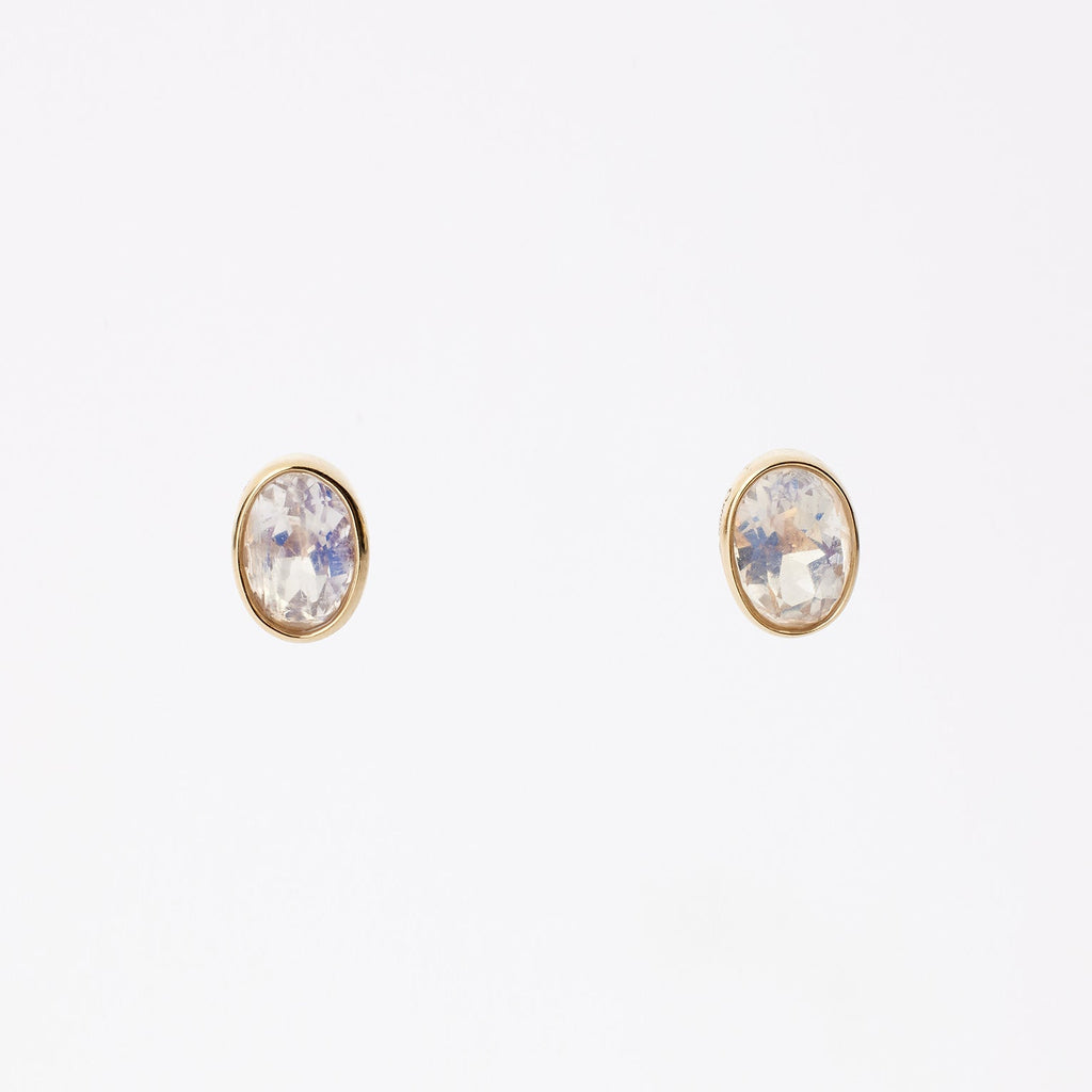 Convertible diamond earrings from Ostara’s Roma collection with moonstone studs; center stone can be customized