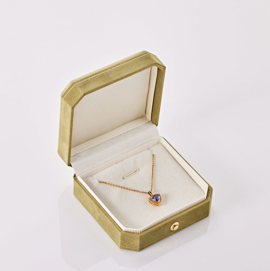 Unheated Tanzanite and diamond necklace in 18K gold from Ostara’s Triquetra collection