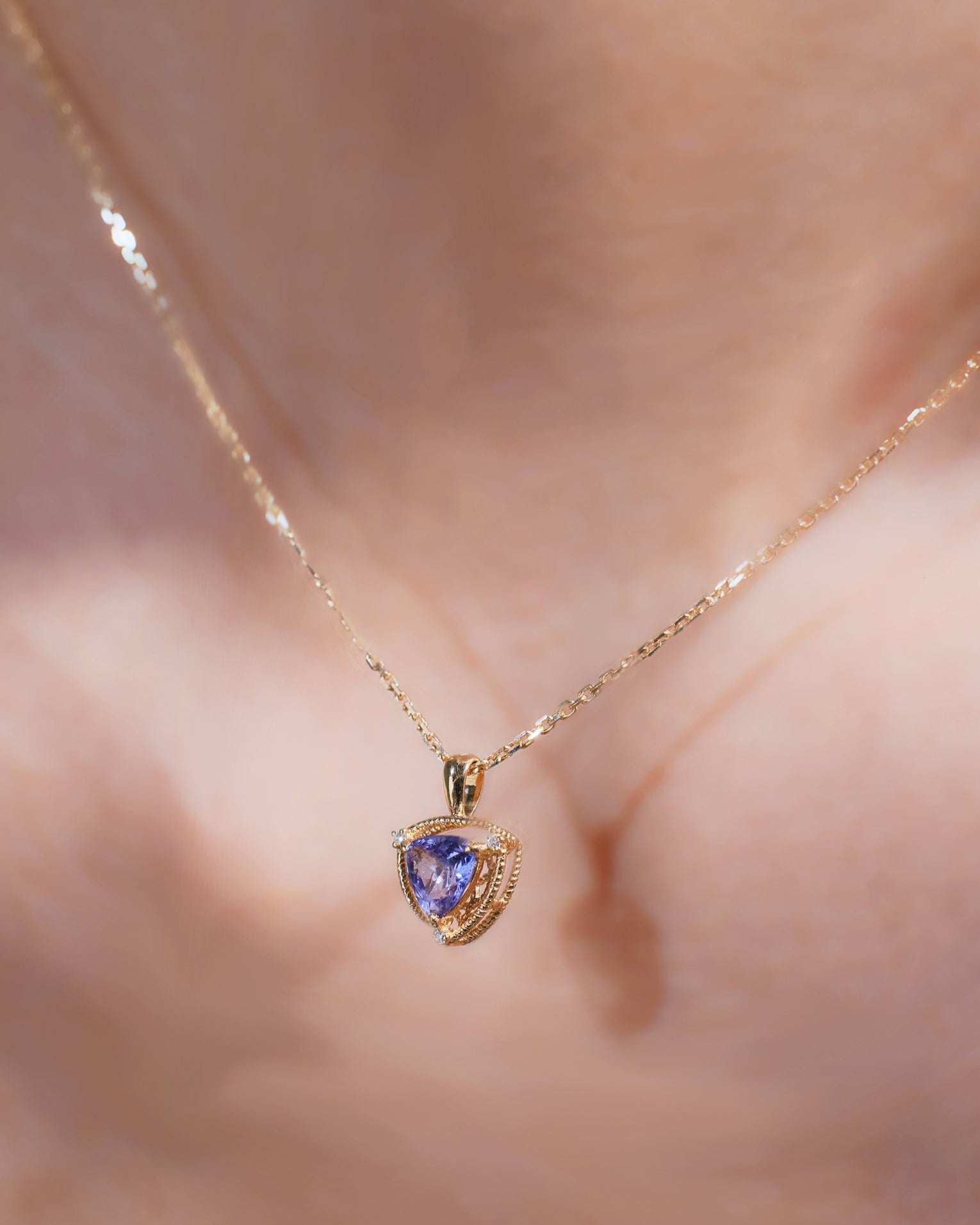 Unheated Tanzanite and diamond necklace in 18K gold from Ostara’s Triquetra collection
